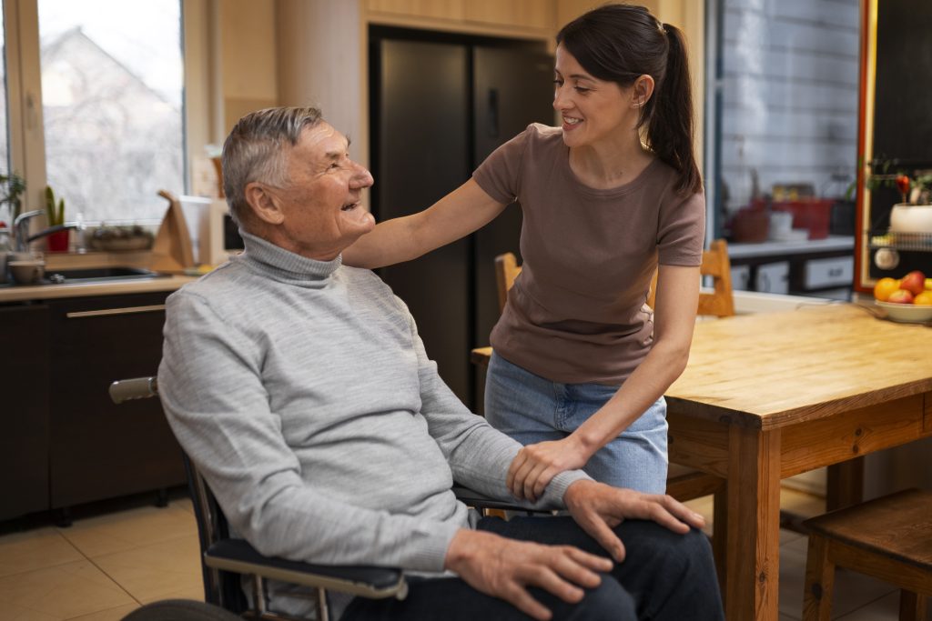 Senior Home Care: Compassionate caregiver assisting elderly woman with daily activities