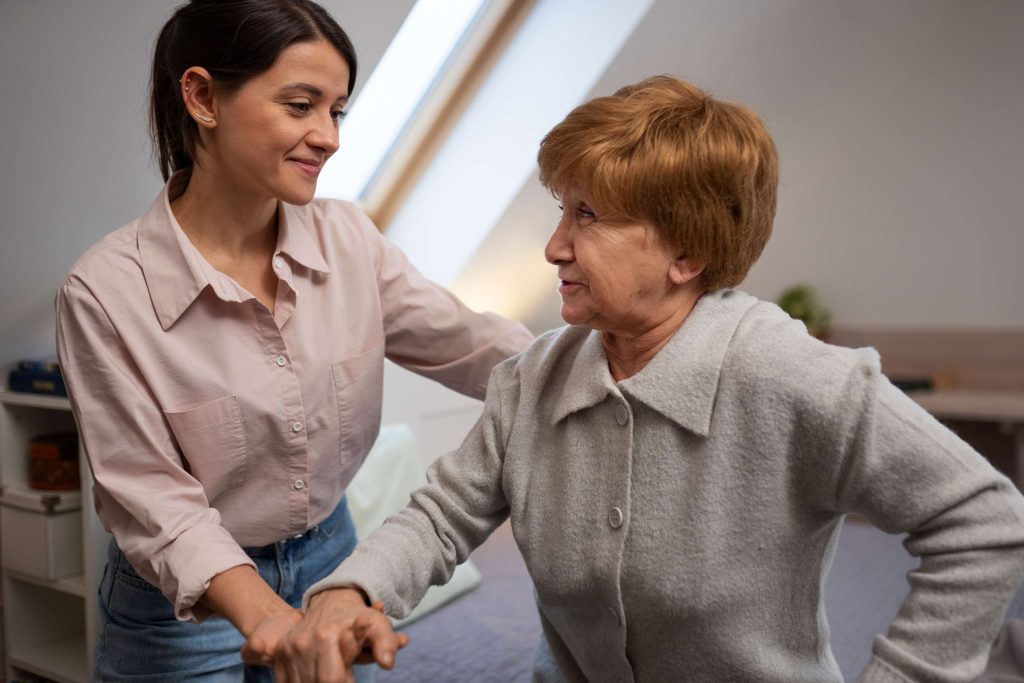 person receiving medication reminders from a domiciliary care provider.